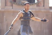 Russell Crowe wields a sword in Gladiator.