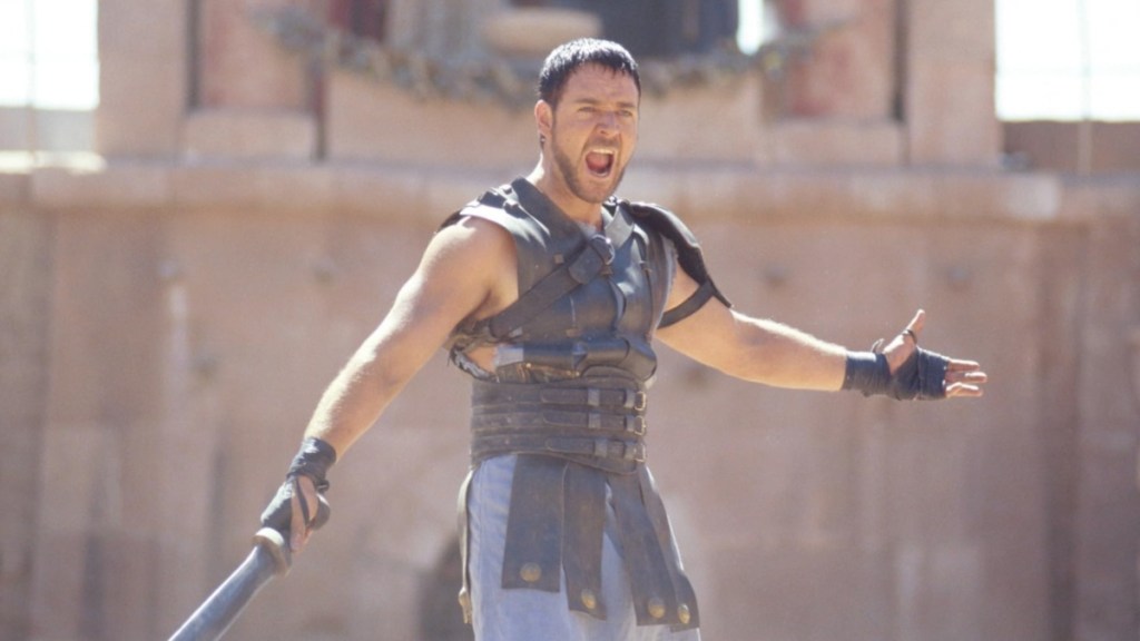 Russell Crowe wields a sword in Gladiator.