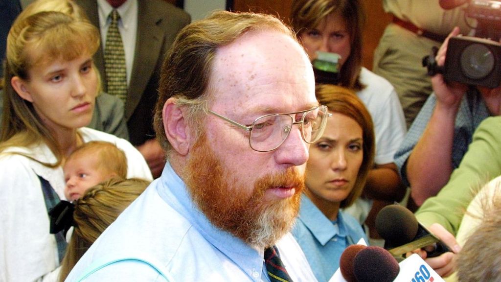 Utah polygamist Tom Green talks with reporters