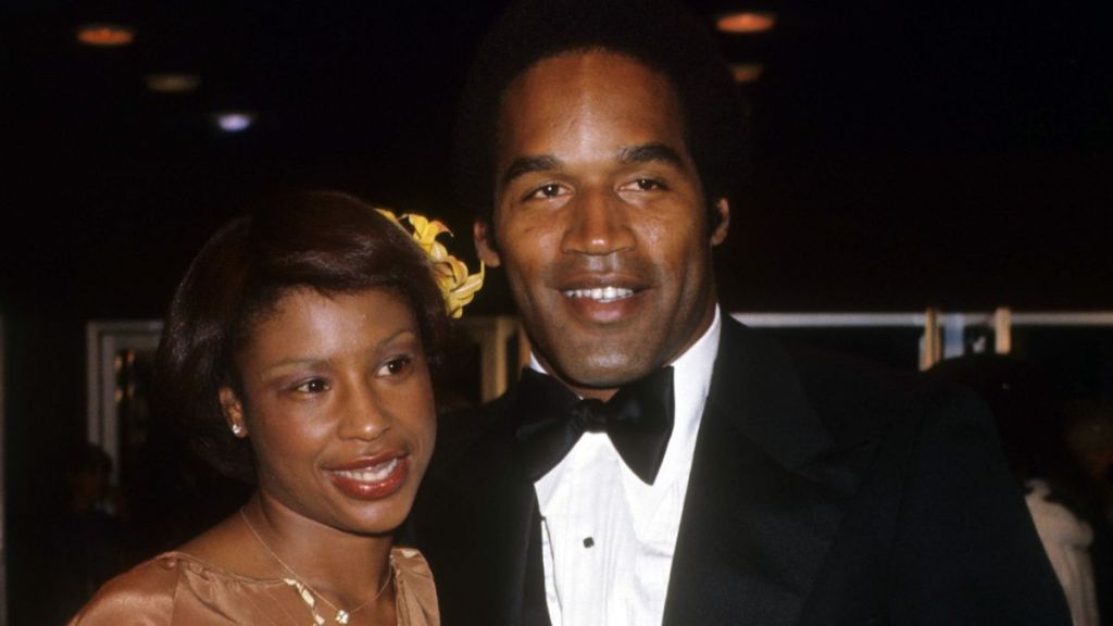 O.J. Simpson and Marguerite Whitley Simpson at a movie premiere