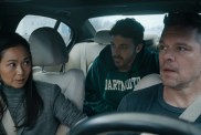 Hong Chau, Casey Affleck, and Matt Damon sit in a car in The Instigators.
