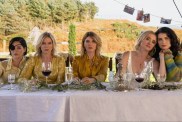 Five sisters sit down at a table in Bad Sisters Season 2.