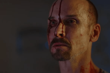 The Pale Face Killer Terrifies Victims in the He Never Left Trailer