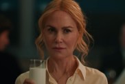 Nicole Kidman holds a glass of milk in Babygirl.