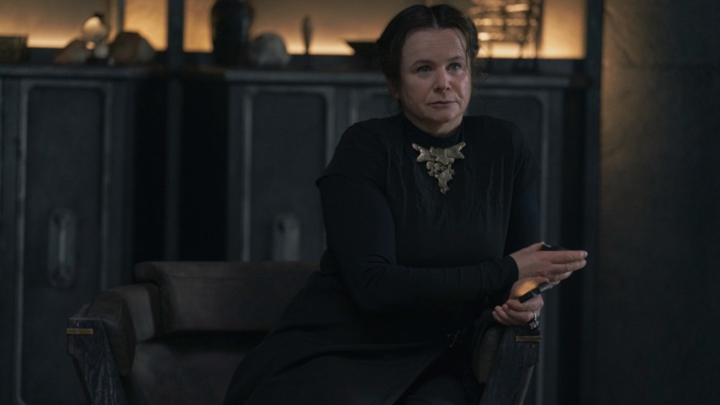 Emily Watson sits down on a chair in Dune: Prophecy.