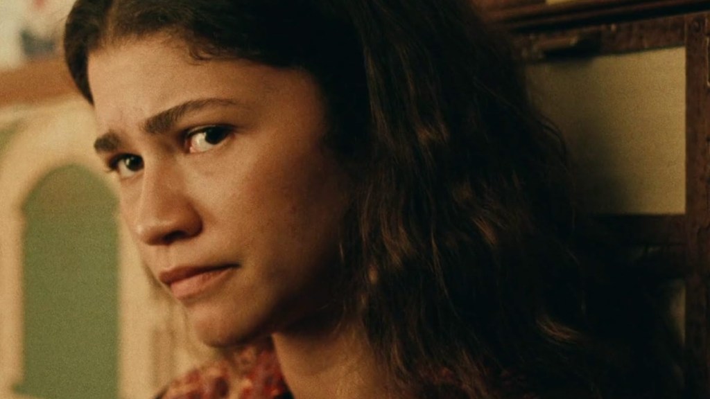 Zendaya leans back and stares in Euphoria.