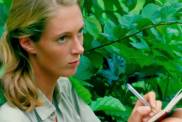 Jane Goodall taking notes in the documentary Jane