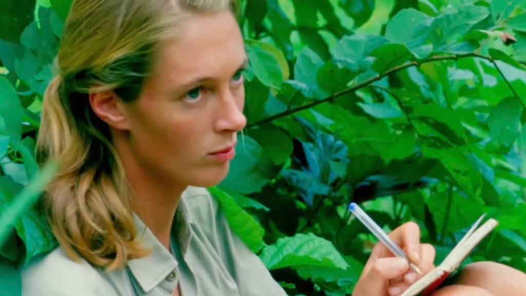 Jane Goodall taking notes in the documentary Jane