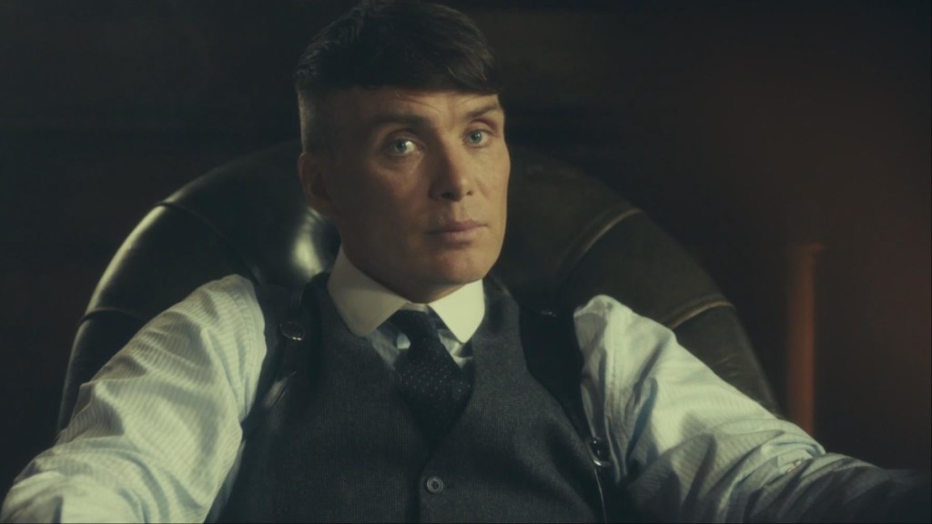 Cillian Murphy sits down and stares in Peaky Blinders.