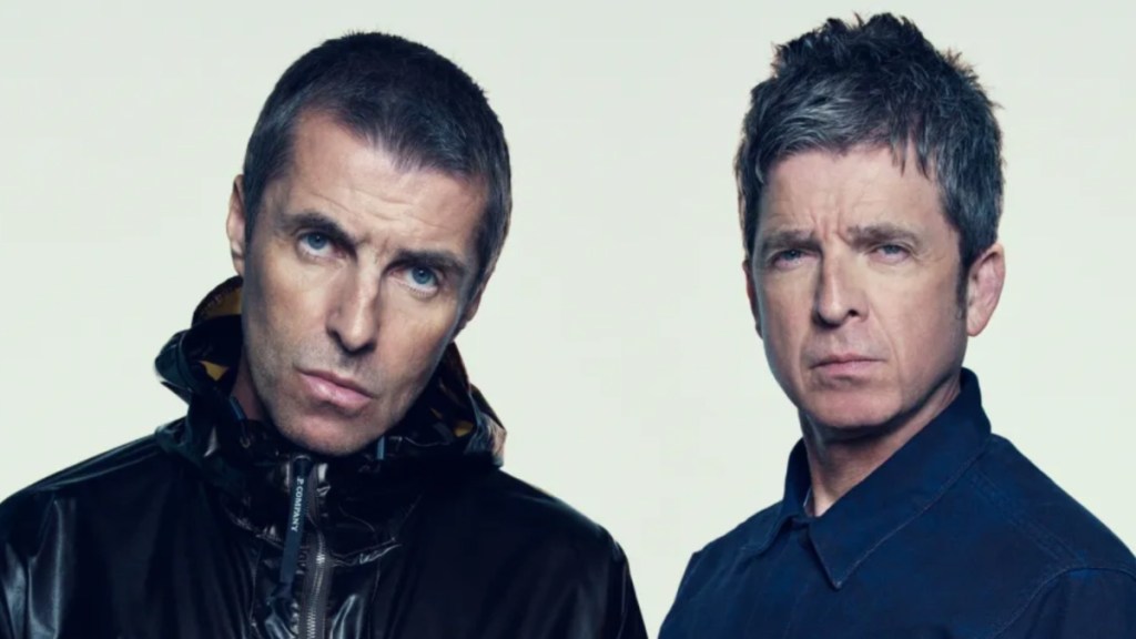 Liam and Noel Gallagher pose for a photo.