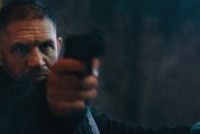 Tom Hardy points a gun in Havoc.